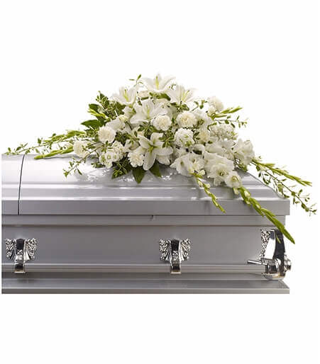 white funeral flowers casket spay